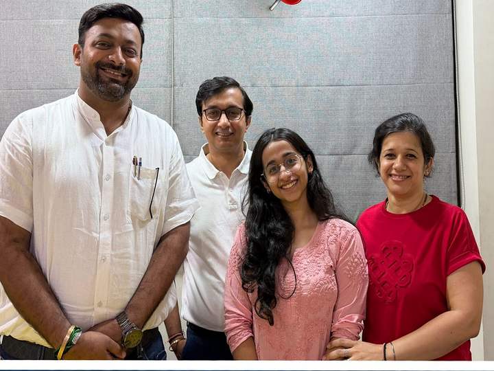 Results day — a student and her parents with Sagar Sir